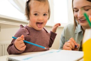 Girl-with-Down-Syndrome-and-Mom-Drawing